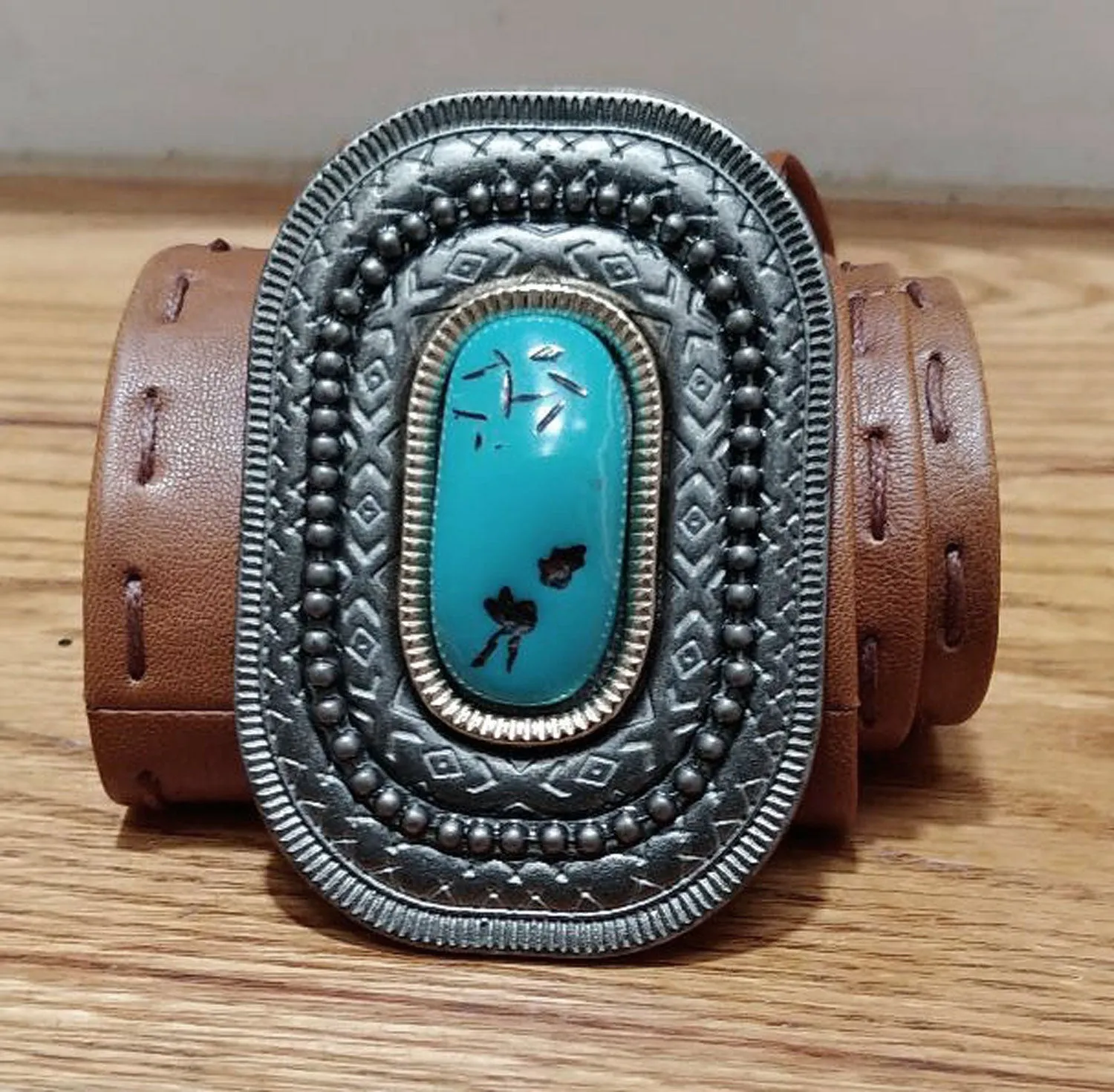 NEW NEVER WORN - FAUX LEATHER BUCKSKIN COLOR SOUTHWEST BELT WITH LARGE FAUX TURQUOISE IN DARK NICKLE LOOK BUCKLE