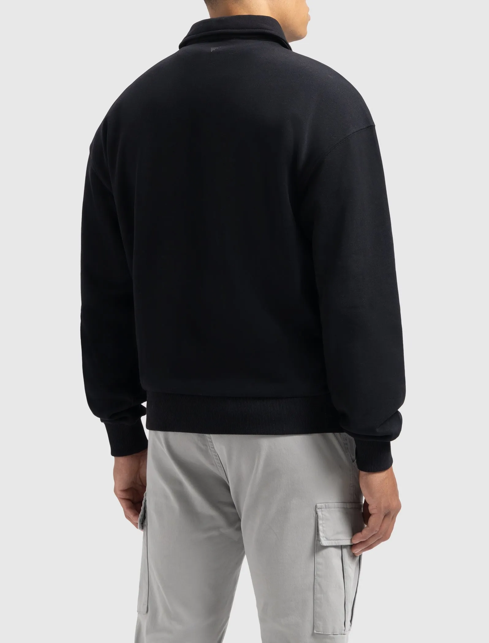 Sideline Wordmark Polo Sweater | Black